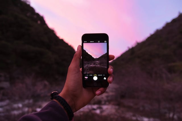 Taking picture of sunset in mountains.jpg
