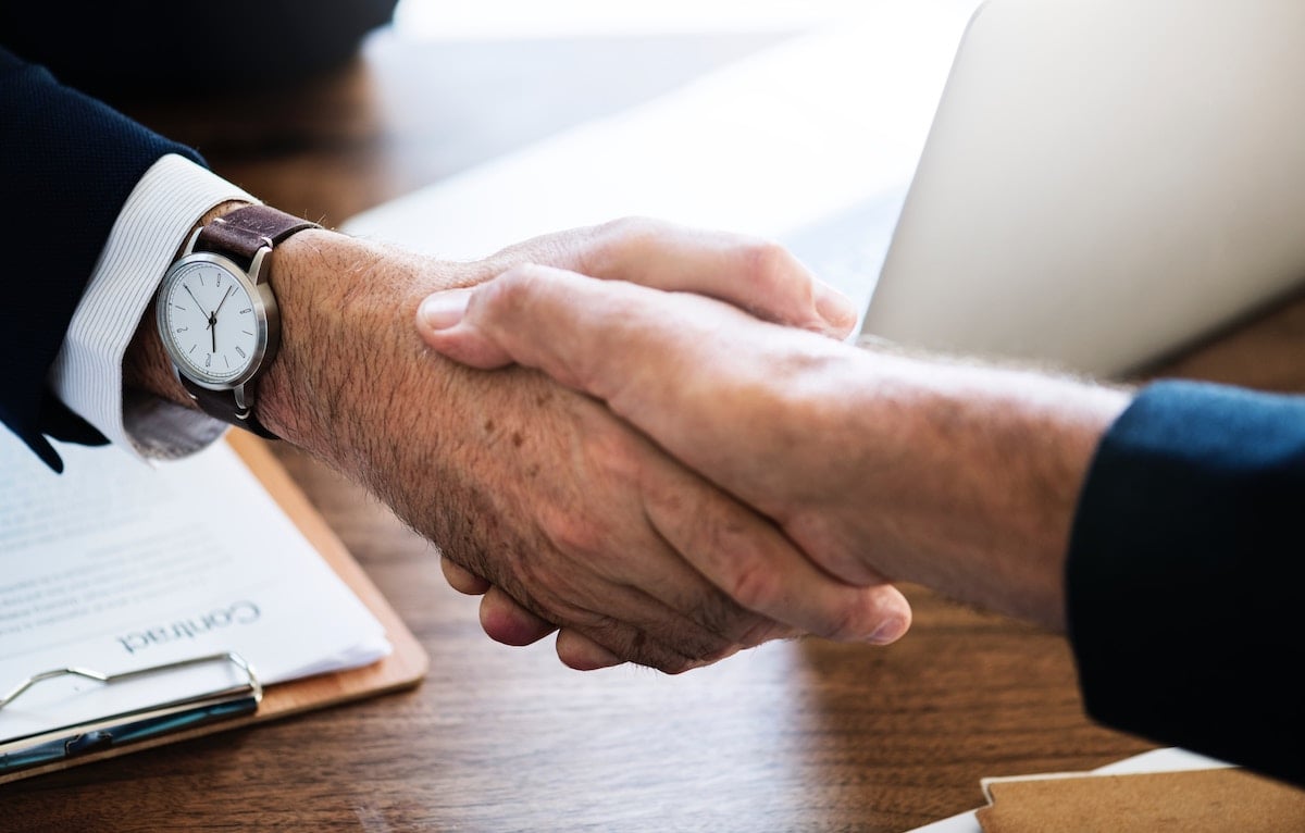 Shaking hands after selling an Instagram account